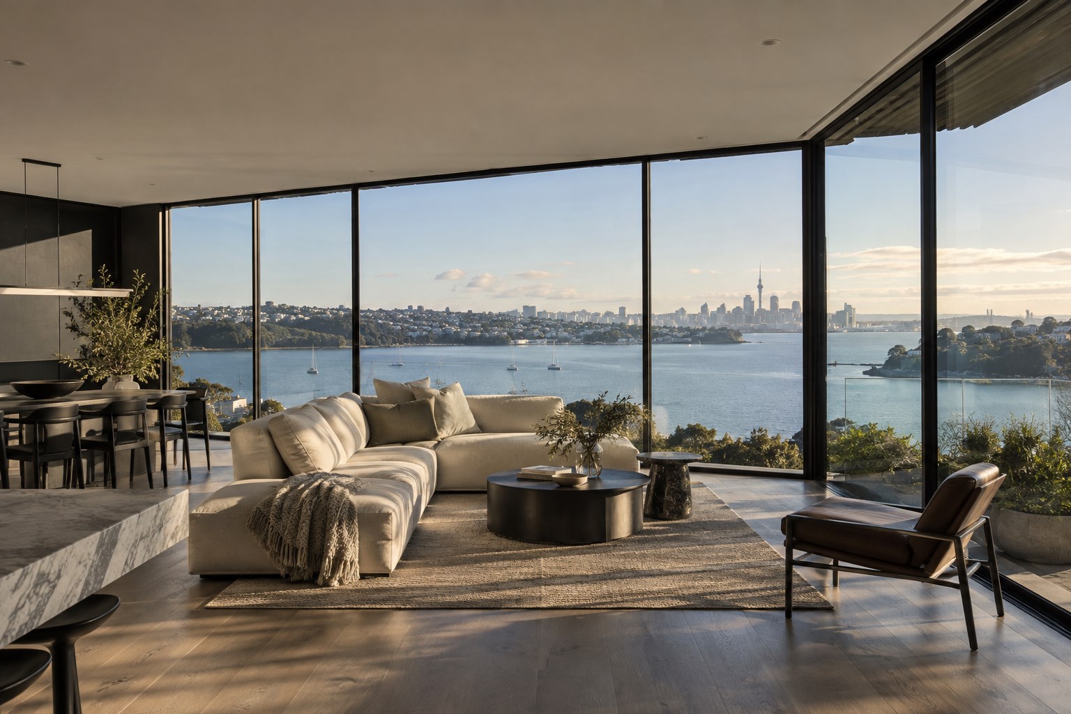 Floor-to-ceiling black aluminium picture windows in a contemporary Auckland home