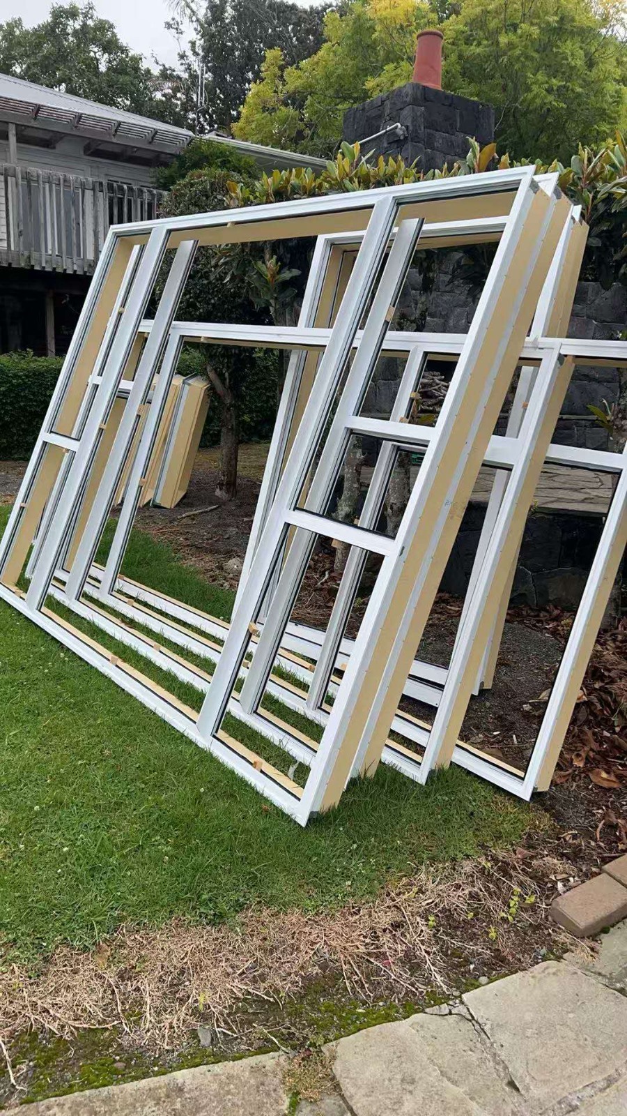 White custom aluminium window frames prepared for installation