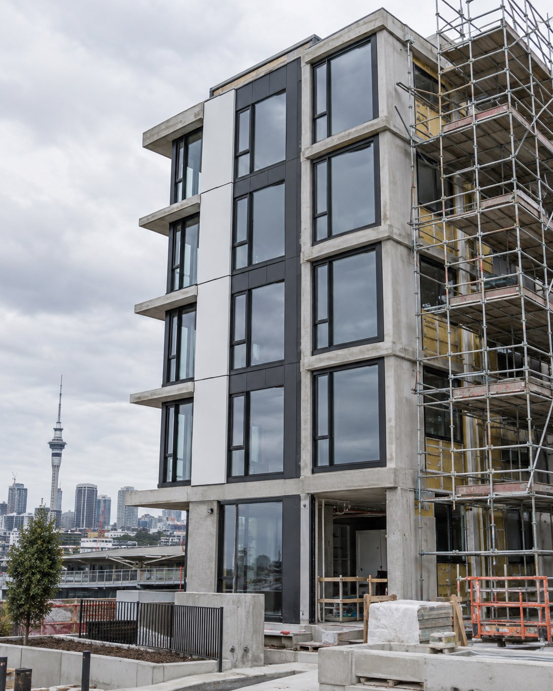Contemporary Auckland apartment project with black aluminium windows and active facade work